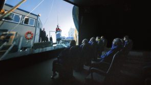 XYZ-Technologies_Riviere-au-Renard_multisensory-projection-room-with-D-Box-seats-and-audience-watching