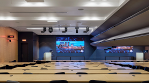 XYZ-Technologies-CRCHUM-full-view-audiovisual-amphitheater-wall-half-retracted