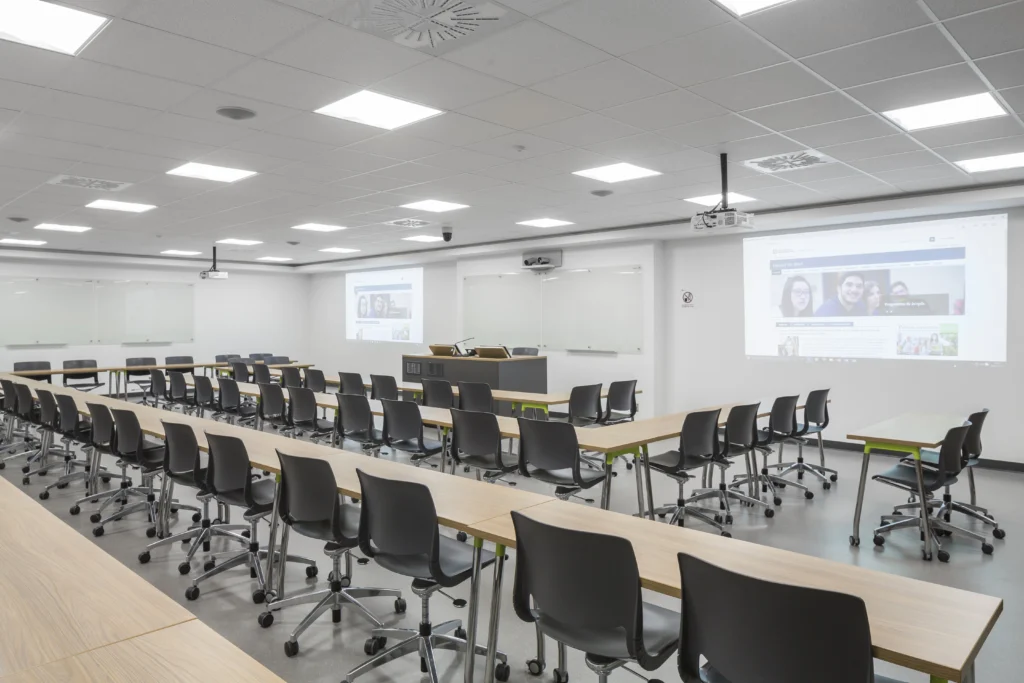 Private school classroom equipped with modern audiovisual installation with interactive board