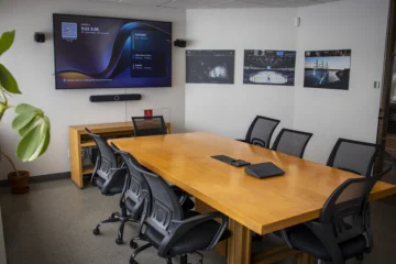 Creating Collaborative Spaces in the Audiovisual Setup of a Coworking Space