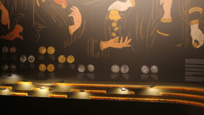 XYZ-Technologies_MNAS_Minted-Narratives_exposition_Coin-illustrations-on-the-wall-and-coin-collection