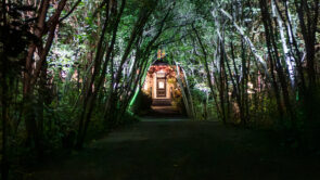 XYZ Technologies MJAL summer luminous nighttime experience illuminated plant tunnel leading to house
